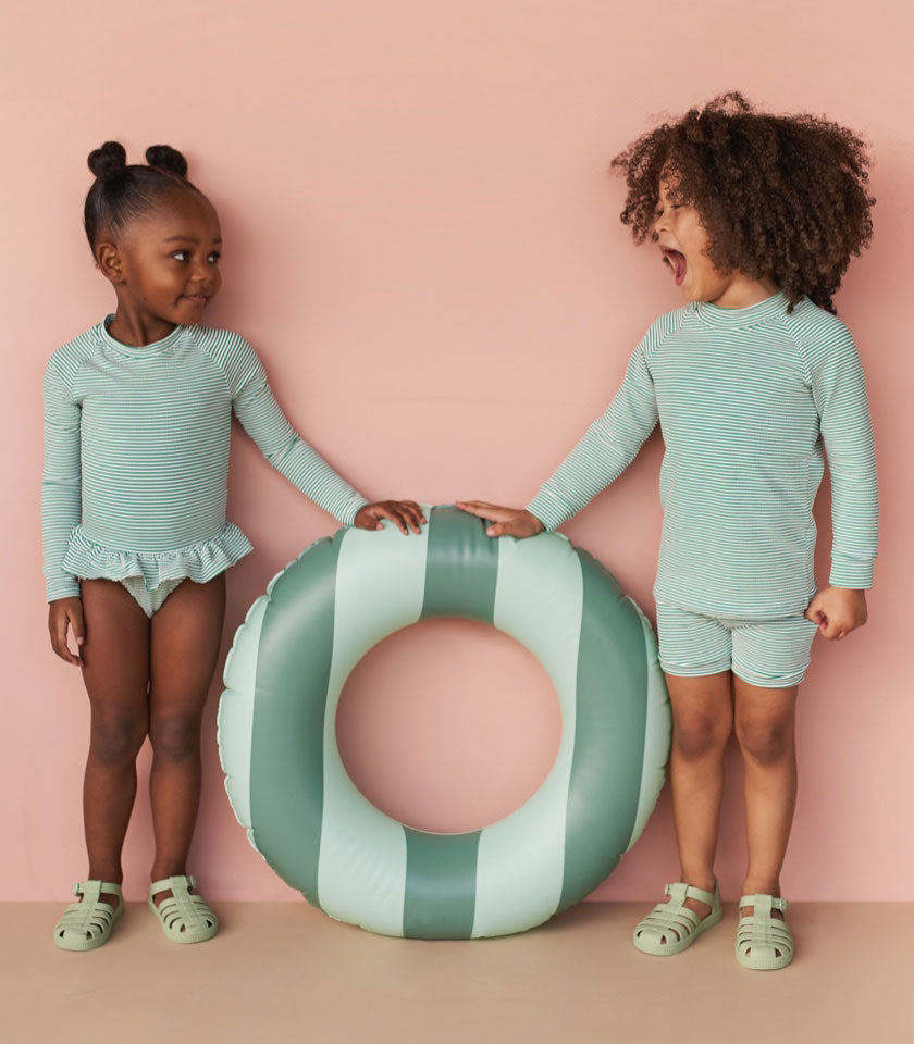 Starlah-Rae (3) & Abel (5) have a giggle showing off our new Seersucker Swimwear in Emerald Stripe.