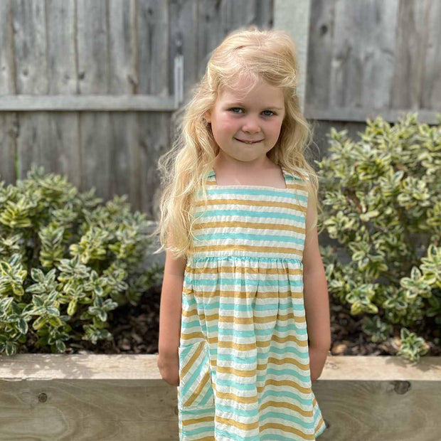 Little Green Radicals Rainbow Striped Reversible Pinny Dress First Impression